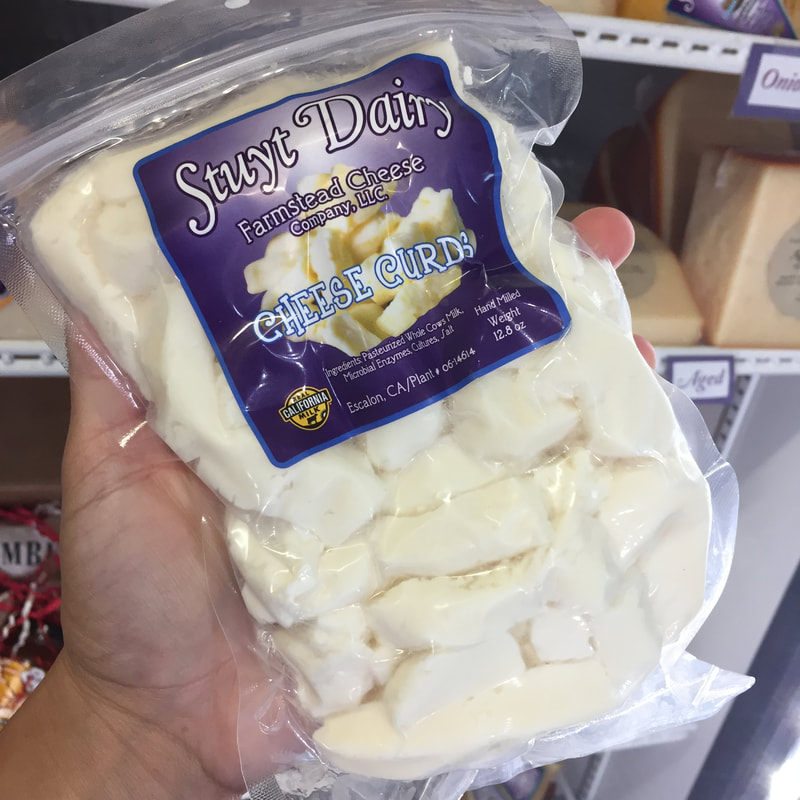 Image contains a bag of regular flavored fresh cheese curds. 